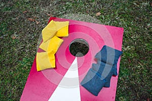 Cornhole Game Board with Stacked Bean Bags