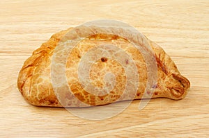 Cornish pasty on wood