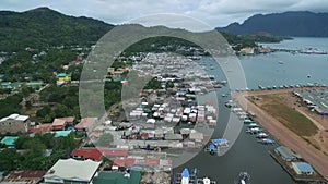 Coron Cityscape with Sulu Sea in Background. Palawan, Philippines. Local Architecure and Seashore in Background X