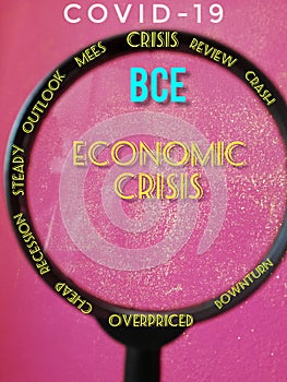 Corona crisis cloud background,magnifying glass where Bce problems due to covid19 are highlighted photo