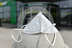 FFP2 mask in front of the entrance of a shopping center in Austria, Europe photo