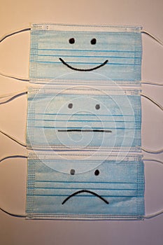 corona medical face masks with happy and unhappy smile