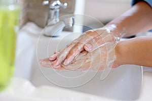 Corona virus prevention, Hygiene to stop spreading coronavirus, Close up of washing hands rubbing with soap, Sanitiser clean hand