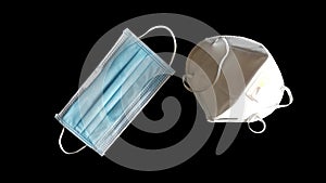 Corona virus prevetion face mask protection N95 masks and medical surgical masks on black background.