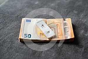 Corona virus SARS-Cov-2 antigen test on euro banknotes