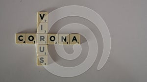 Corona virus script written with blocks on white background