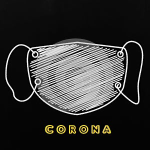 Corona virus symbol medical mask hand drawn on blackboard