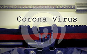 Corona Virus text on white sheet in vintage typewriter