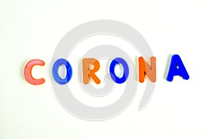 CORONA word written in various colored letter blocks on a white background