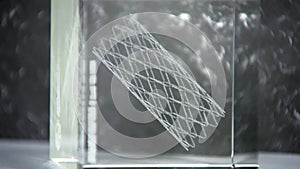 Coronary stent, tube-shaped device placed for coronary arteries, closeup view in clinic