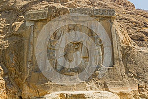 Coronation of Ardashir II relief at Taq-e Bostan in Kermanshah, Ir photo