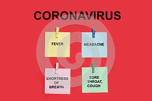 Coronavirus 2019-nCoV symptoms. Multicolored Sticky notes on red wall