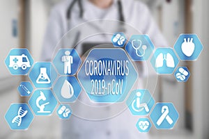 Coronavirus 2019-nCoV  words on the virtual screen on Medical Doctor in hospital background.  Coronavirus outbreak awareness