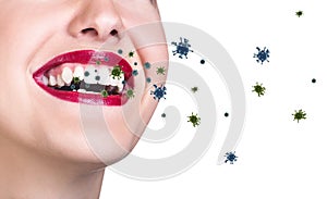 Coronavirus cells fly out from oprn mouth of young woman.