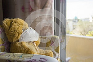 Coronavirus child: teddy bear with mask