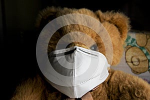 Coronavirus child: teddy bear with mask