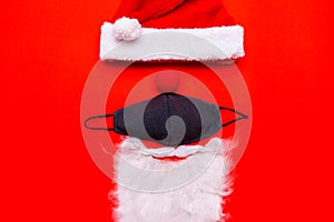 Coronavirus Christmas. Santa Claus Hat red nose Face Mask white beard.Flat lay top view