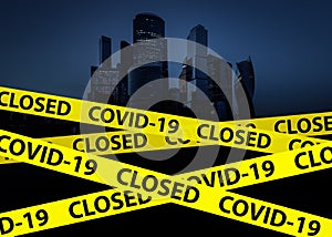 Coronavirus concept, city closed with caution tape due to COVID-19. Stores, restaurants, offices, other public places temporarily