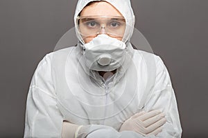 Coronavirus covid-19 disinfection. Portrait caucasian doctor in protective medical suit, biological hazard, medical mask FFP3,