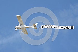 Coronavirus covid-19 novel disease aeroplane plane aircraft sign notice warning public health stay at home