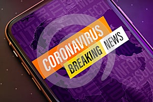 Coronavirus or Covid-19 pandemic  Breaking News Update background concept. Close up mobile phone with Coronavirus breaking news