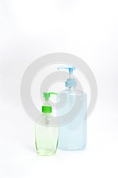 Coronavirus COVID-19 protection blue and green gel sanitizer set, isolated on white background in studio light