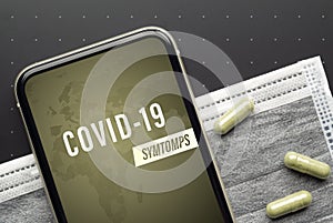 Coronavirus or Covid-19 symtoms and checking application concept. Mockup mobile phone Coronavirus with facial masks, medicine