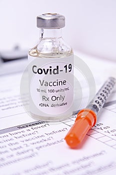 Coronavirus Covid-19 Vaccine and Syringe close up