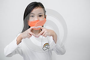 Coronavirus Covid-19 virus and Air pollution pm2.5.Asian child girl  protect from virus stop coronavirus covid 19 outbreak.Child