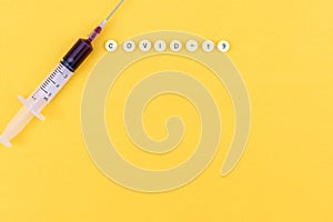 Coronavirus COVID-19 testng concept, medical testing equipment on yellow background