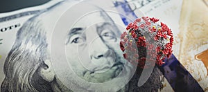 Coronavirus Covid19 on one hundred dollar bill. Economic crisis