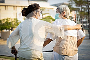 Coronavirus ended,Happy old people,asian senior women are walking in public outdoor,end of social distancing,end of stay home,end photo