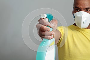 Coronavirus man with spray stock photo