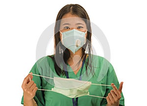 Coronavirus outbreak in China - young beautiful Asian Chinese medicine doctor woman or hospital nurse recommend use of protective