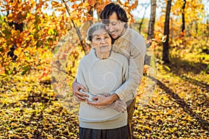 Coronavirus is over. Quarantine weakened. Take off the mask. Now you can Meet grandparents - grandmother and grandfather