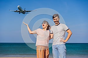 Coronavirus is over. Quarantine weakened. Take off the mask. Now you can travel. Man and woman tourists have fun on the
