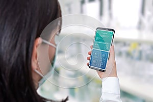 Coronavirus positive test on smart phone app in infectious disease specialist hand