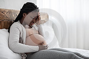 Coronavirus And Pregnancy. Sick Black Pregnant Woman Feeling Unwell, Having Covid-19 Symptoms