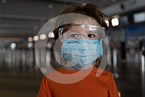 Coronavirus protection. Child face in a mask.