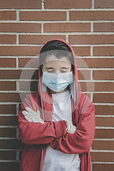 Coronavirus,sad kid wearing medical mask