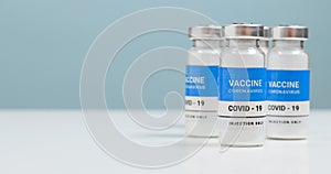 Coronavirus Sars-Cov-2 vaccine anti-virus vials with copy space in the laboratory