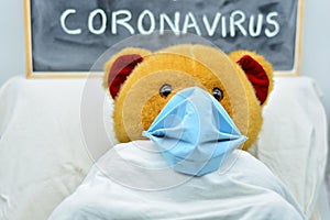 Coronavirus sick teddy bear, isolated photo