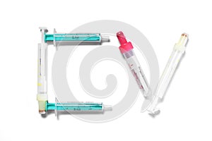 Coronavirus sign made of syringes without needles