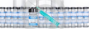 Coronavirus Vaccine bottle Corona Virus syringe COVID-19 Covid vaccines copyspace copy space panoramic photo