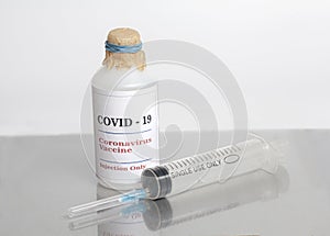 Coronavirus Vaccine injection vials medicine drug bottle Covid-19 with syringe