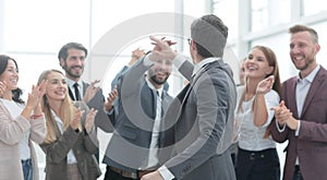 corporate business team congratulating project Manager on success