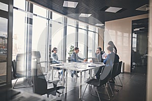 Business team and manager in a meeting photo