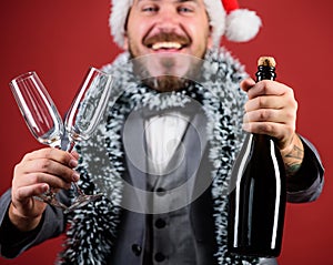 Corporate christmas party. Lets drink champagne. Boss santa hat tinsel celebrate new year or christmas. Christmas party