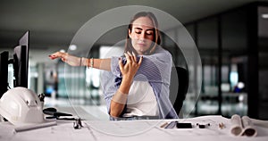 Corporate Executive Doing Stretch Exercise