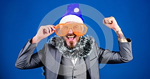 Corporate holiday party ideas employees will love. Corporate christmas party. Man bearded hipster wear santa hat and